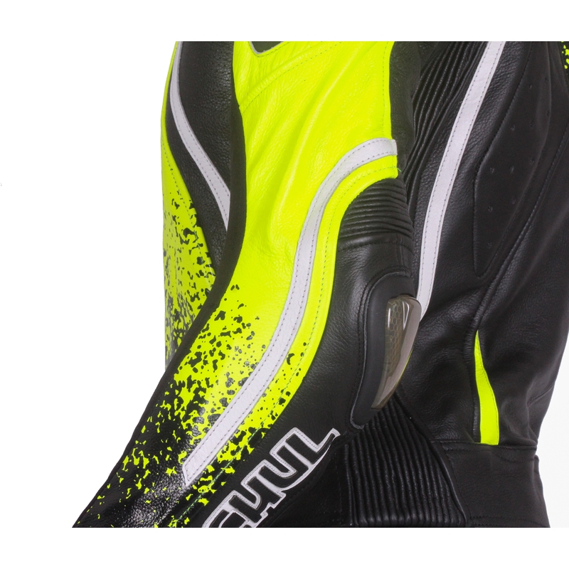 Mono de hombre Tschul 585 negro-amarillo fluo liquidación