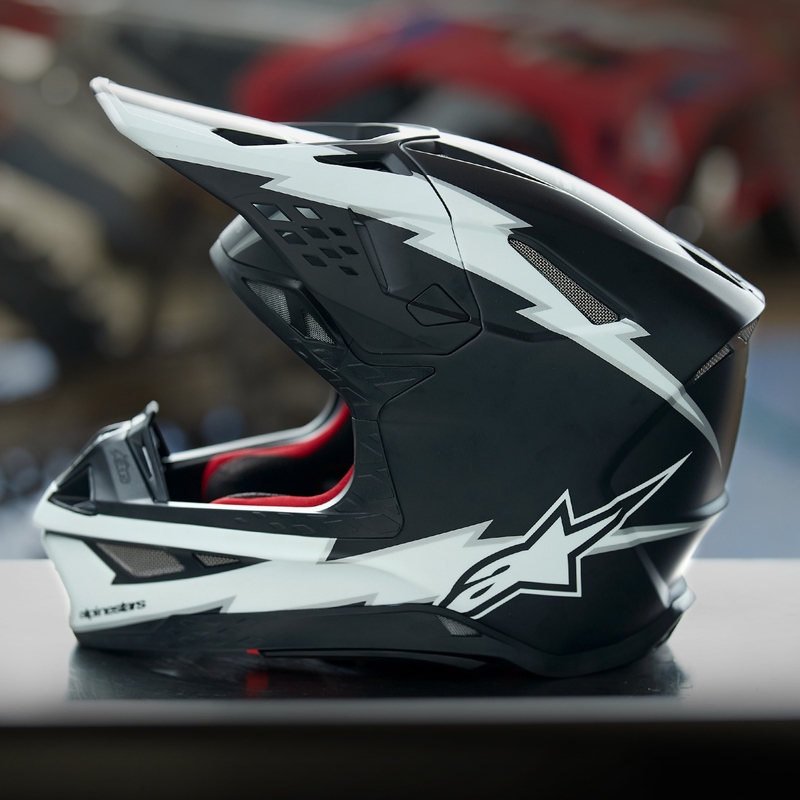 Casco de motocross Alpinestars Supertech S-M10 Ampress negro mate y blanco