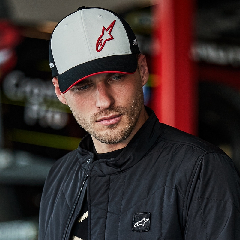Gorra snapback Sessionized de Alpinestars en blanco, negro y rojo