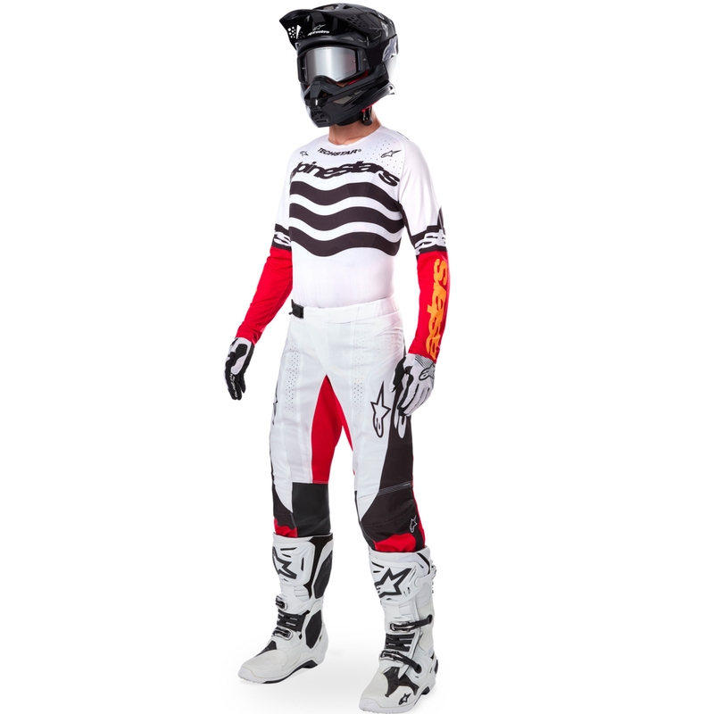 Camiseta de motocross Alpinestars Techstar edición limitada en negro intenso, blanco, rojo fluorescente y naranja.