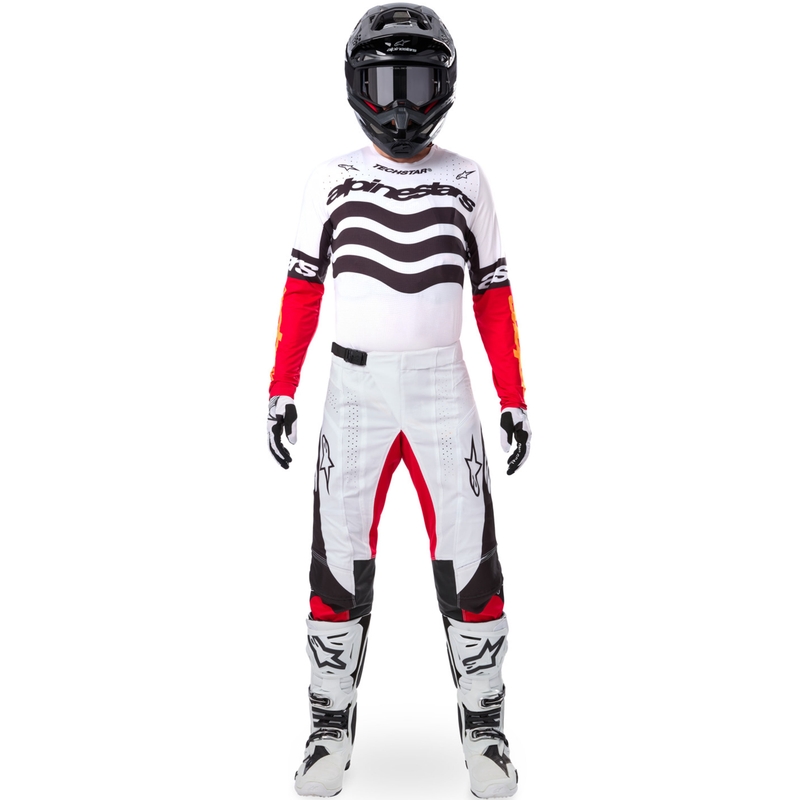 Camiseta de motocross Alpinestars Techstar edición limitada en negro intenso, blanco, rojo fluorescente y naranja.