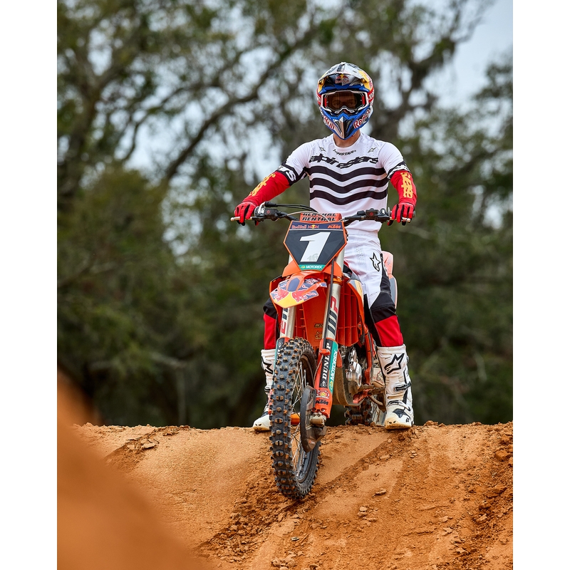 Camiseta de motocross Alpinestars Techstar edición limitada en negro intenso, blanco, rojo fluorescente y naranja.