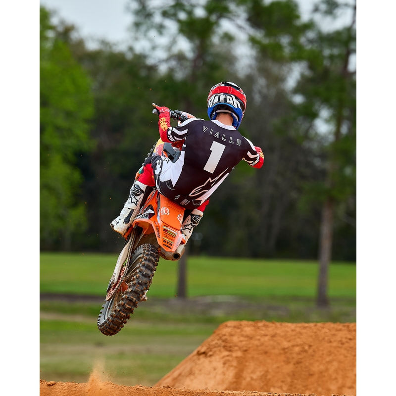 Camiseta de motocross Alpinestars Techstar edición limitada en negro intenso, blanco, rojo fluorescente y naranja.