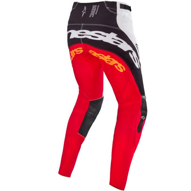 Pantalones de motocross Alpinestars Techstar edición limitada en negro intenso, blanco, rojo fluorescente y naranja.