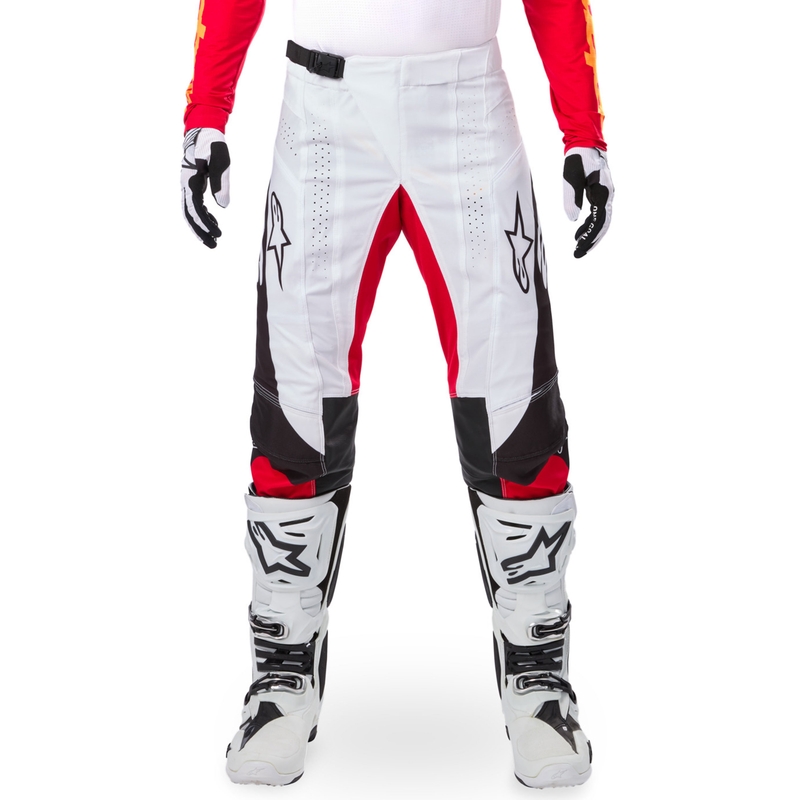 Pantalones de motocross Alpinestars Techstar edición limitada en negro intenso, blanco, rojo fluorescente y naranja.