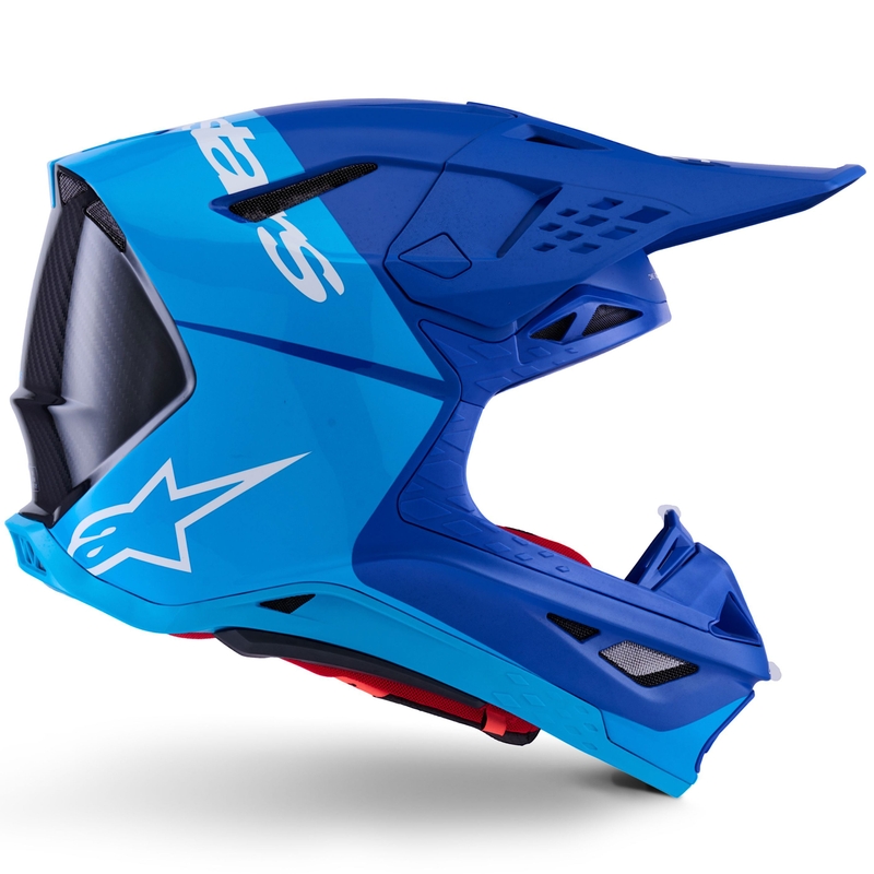 Casco de motocross Alpinestars Supertech S-M10 Flood en azul perla, azul claro, negro, carbono, mate y brillante.