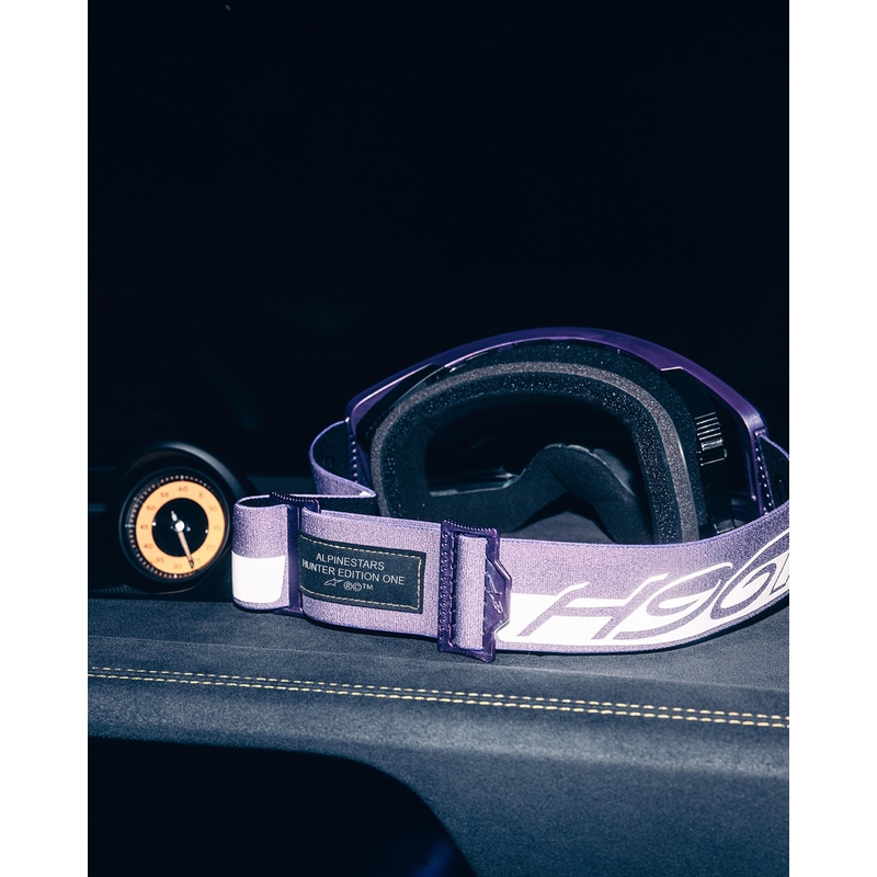 Gafas de motocross Alpinestars Supertech Vision Hunta96 XXV en color morado-blanco con plexiglás plateado espejo