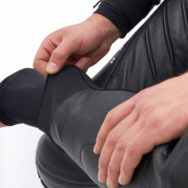 Pantalones de cuero para moto Rebelhorn Veloce, blanco y negro.