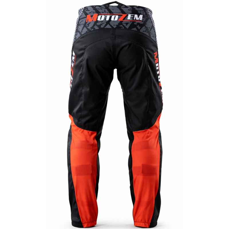 Pantalones de motocross MotoZem Ground MX en negro, blanco y rojo.