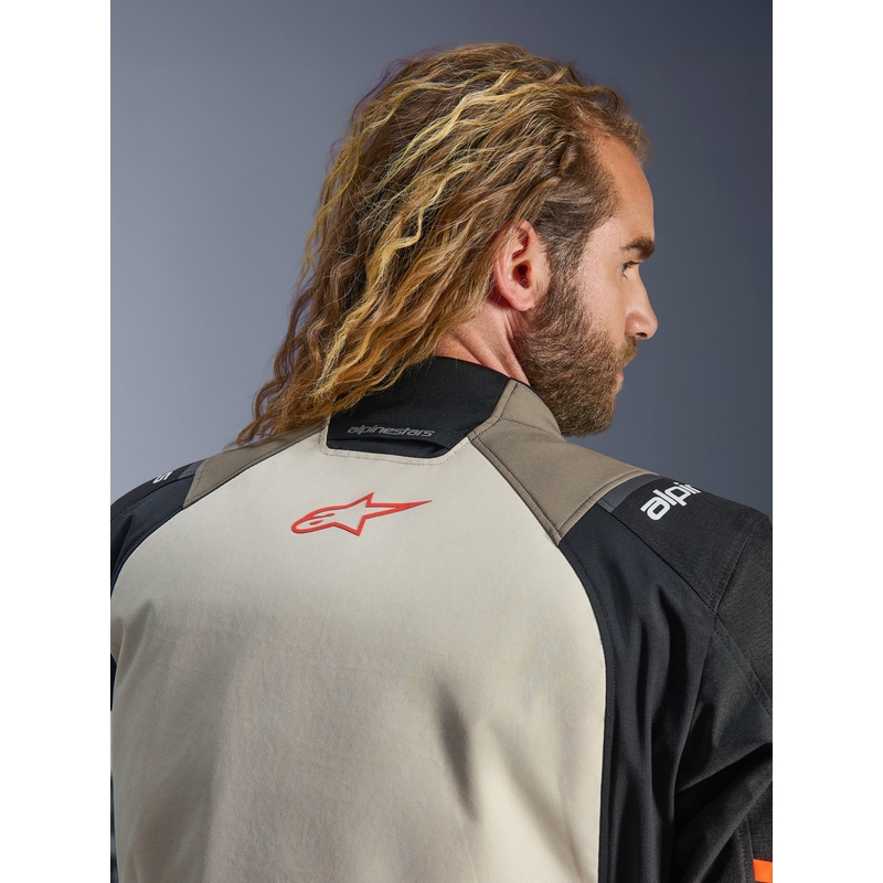 Chaqueta de moto Alpinestars Andes V4 Drystar color crema, marrón claro, negro y naranja fluorescente