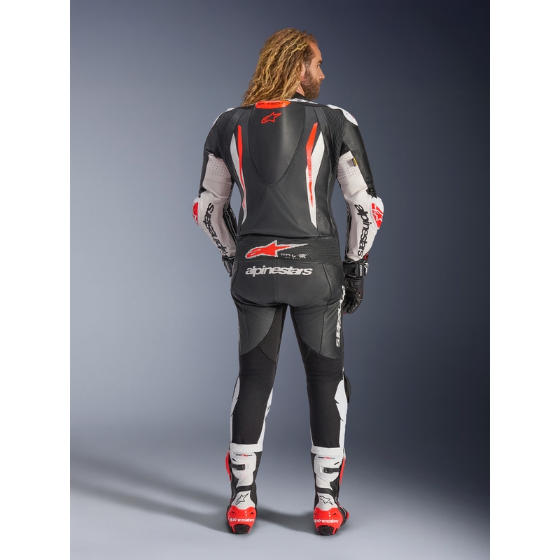 Mono de moto de cuero Alpinestars GP TECH V5 de una pieza, negro, blanco y rojo flúor.