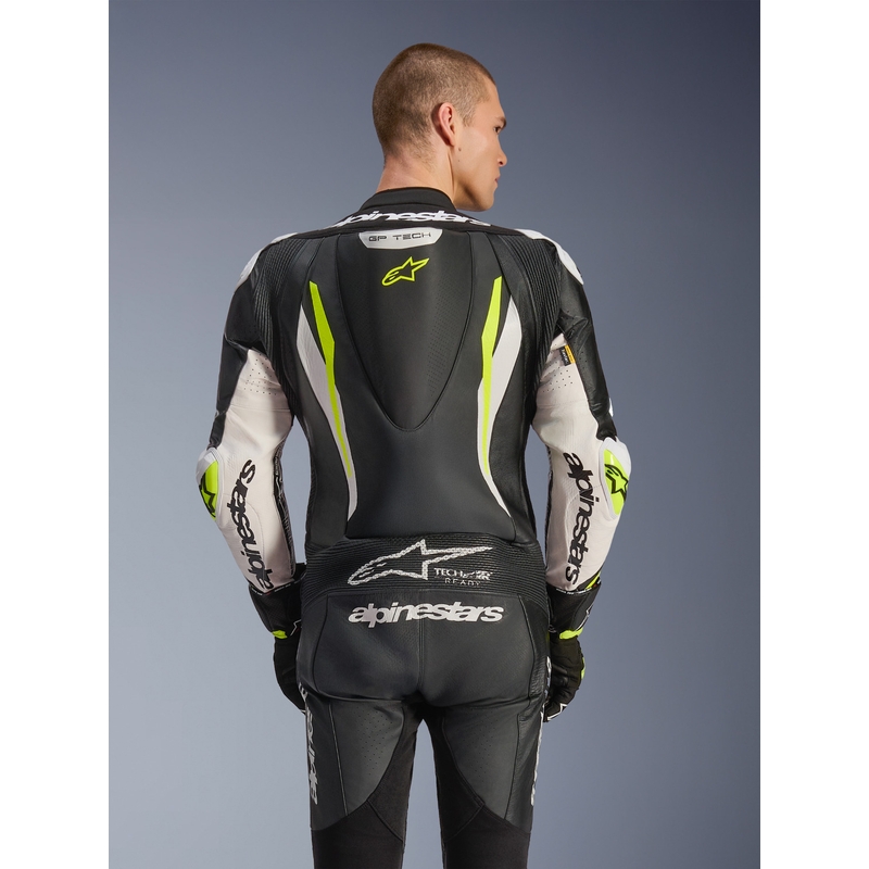 Mono de moto Alpinestars GP TECH V5 de una pieza, de cuero, color negro, blanco y amarillo flúor.