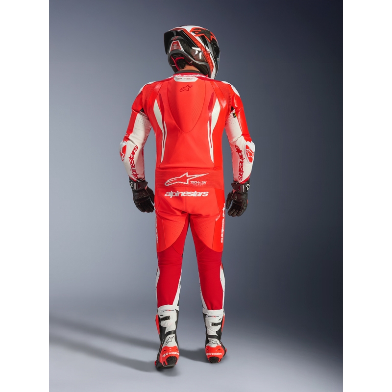 Mono de moto Alpinestars GP TECH V5 de una pieza, color rojo flúor, rojo y blanco.