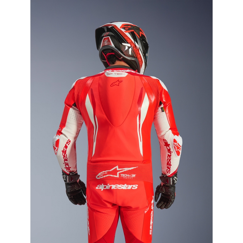 Mono de moto Alpinestars GP TECH V5 de una pieza, color rojo flúor, rojo y blanco.