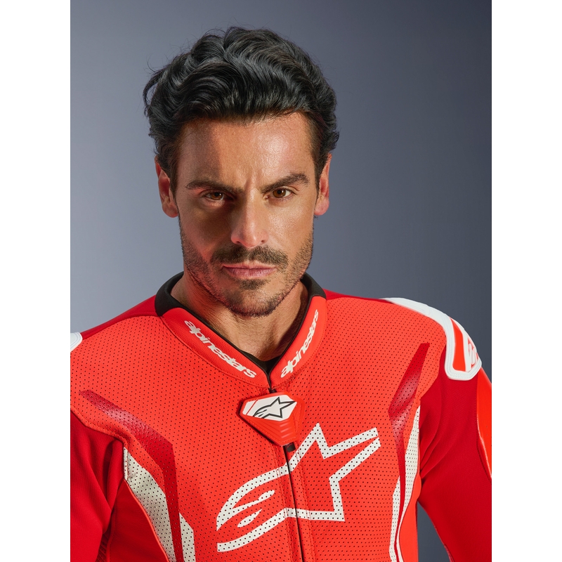 Mono de moto Alpinestars GP TECH V5 de una pieza, color rojo flúor, rojo y blanco.