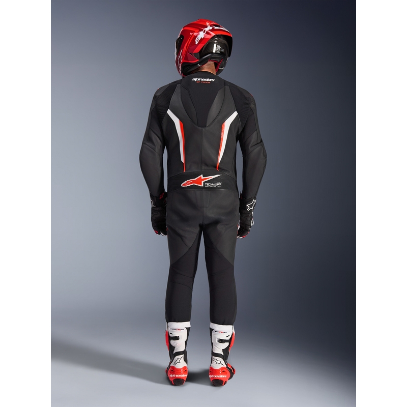 Mono de moto Alpinestars GP FORCE V2 de una pieza, negro, blanco y rojo flúor.