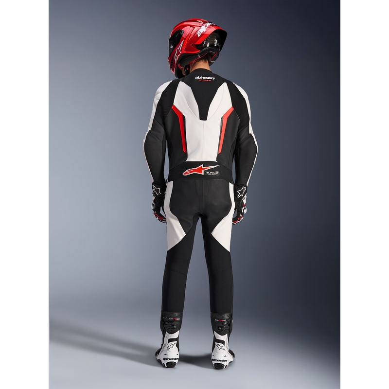 Mono de moto Alpinestars GP FORCE V2 de una pieza, blanco, negro y rojo flúor.