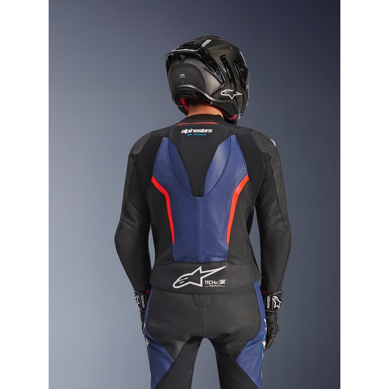 Mono de moto Alpinestars GP Force V2 de dos piezas, negro, azul y rojo flúor.