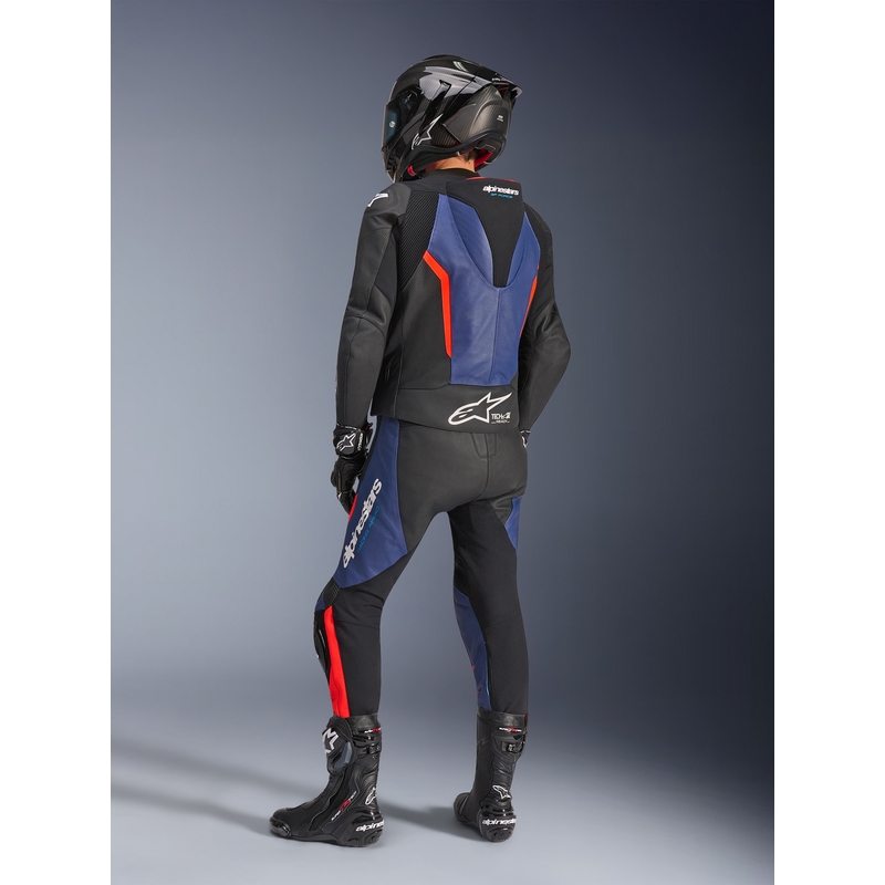 Mono de moto Alpinestars GP Force V2 de dos piezas, negro, azul y rojo flúor.