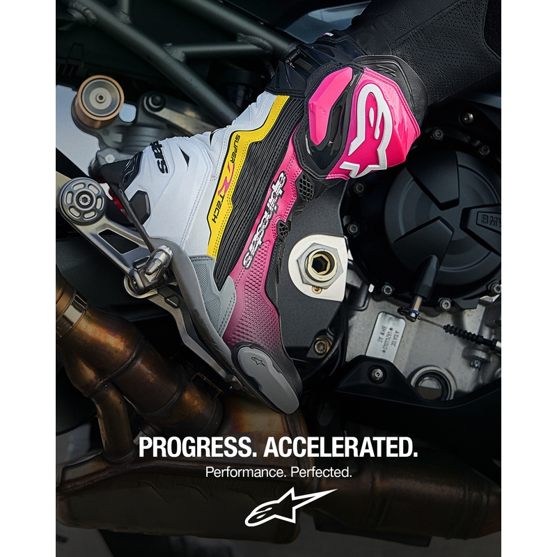 Botas de moto Alpinestars Supertech R negras, blancas, rosas y amarillas