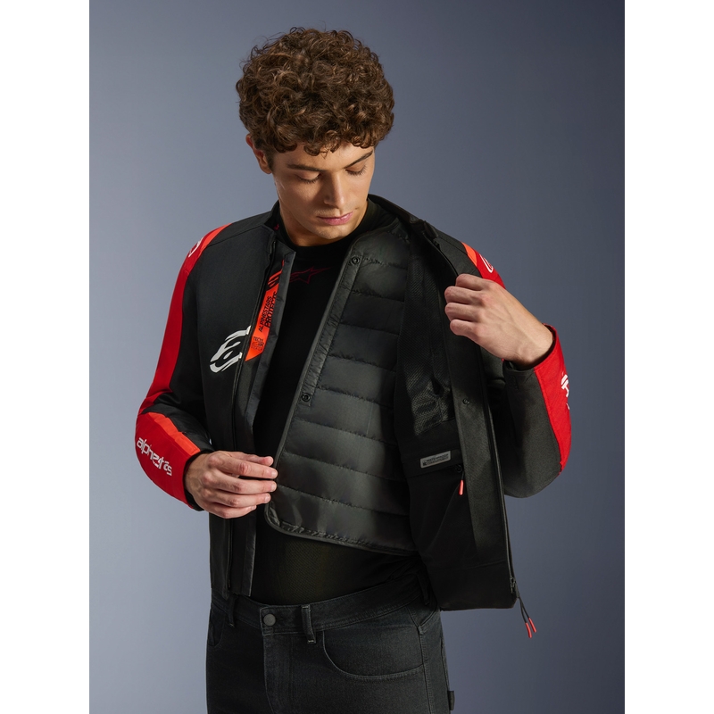 Chaqueta de moto impermeable Alpinestars T-SPS 2 en rojo, negro y blanco.