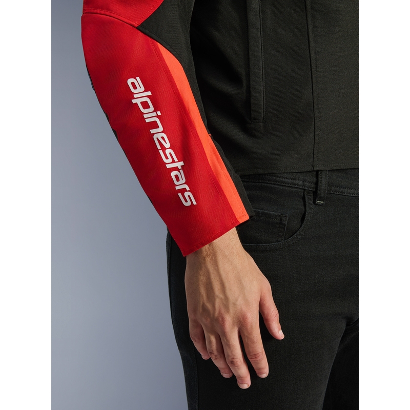 Chaqueta de moto impermeable Alpinestars T-SPS 2 en rojo, negro y blanco.