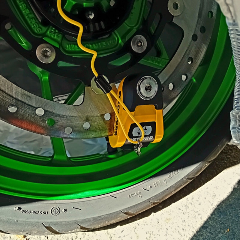 Candado de freno de disco Oxford Quartz Alarm XA10 amarillo-negro