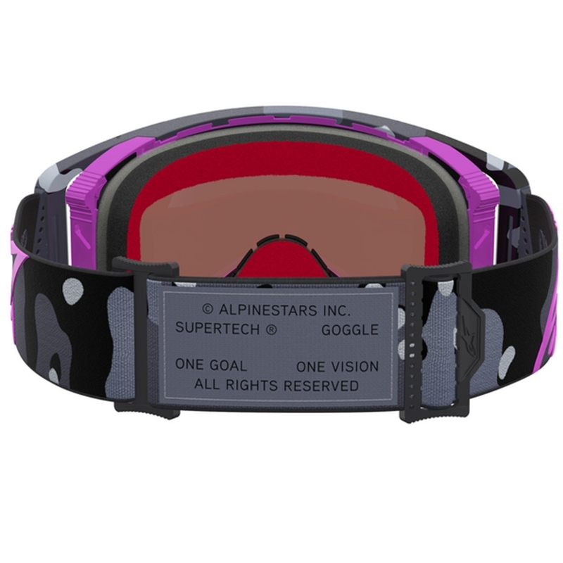 Gafas de motocross Alpinestars Supertech Lone con estampado de camuflaje morado y cristal de plexiglás rosa espejado.