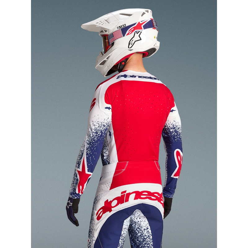 Camiseta de motocross Alpinestars Techstar edición limitada Unity en rojo, blanco y azul.