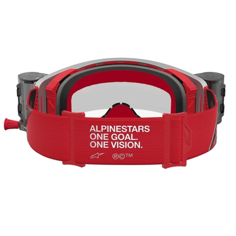 Gafas de motocross Alpinestars Supertech Firma rojas y plateadas con plexiglás transparente.