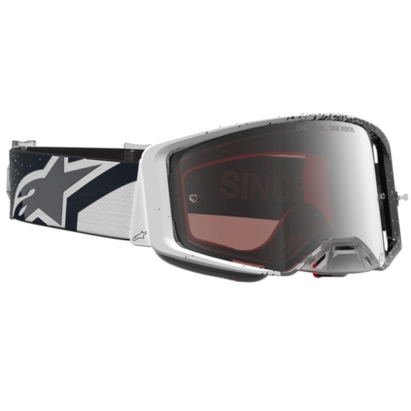 Gafas de motocross Alpinestars Supertech blancas y negras con plexiglás plateado espejado.