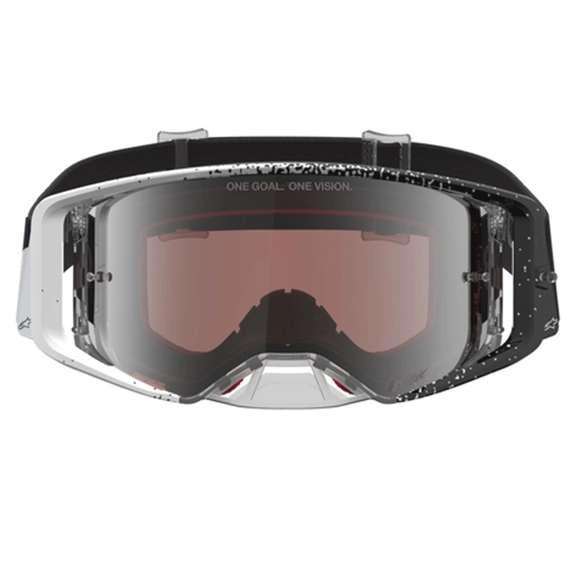 Gafas de motocross Alpinestars Supertech blancas y negras con plexiglás plateado espejado.